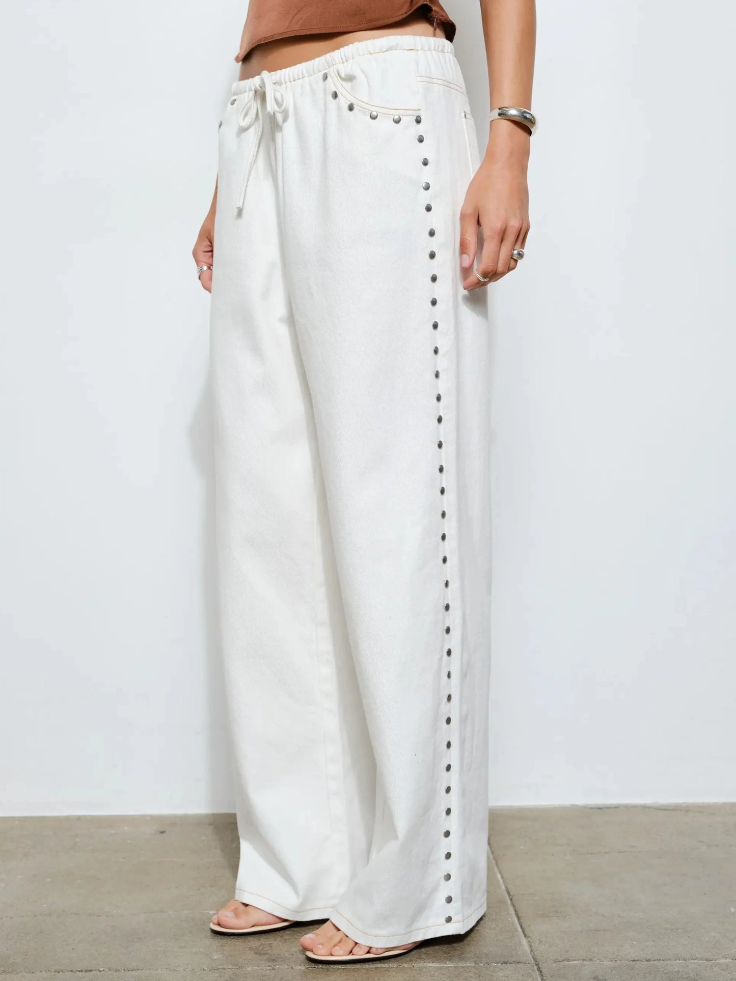 studded drawstring jeans