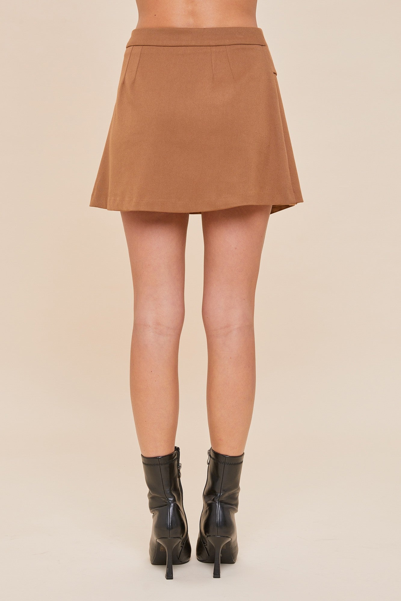 pleated belted mini skirt